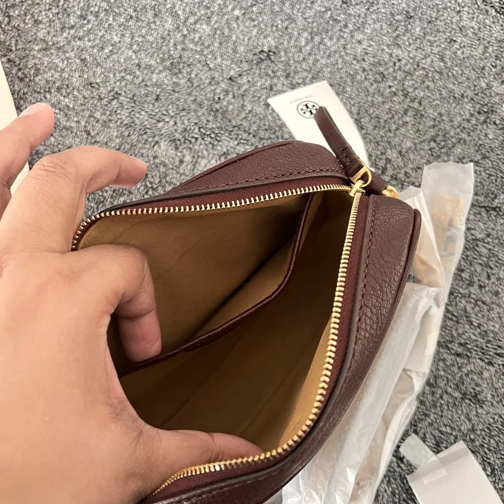 TORY BURCH • TEXTURED MCGRAW LEATHER CAMERA BAG- color WINE